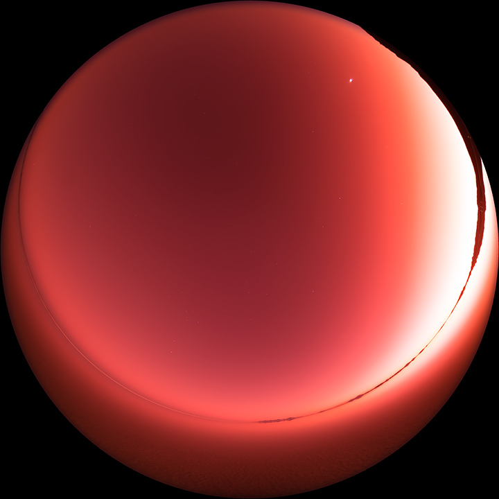 火山薄明で赤く染まって行く夕空